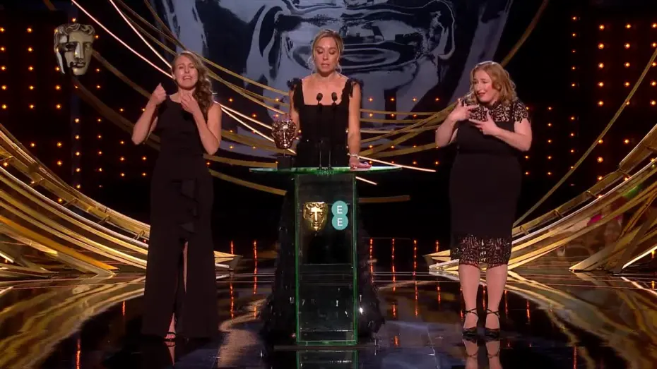 Відео до фільму У ритмі серця | Sian Heder reveals her sign-language nickname while accepting her award for CODA | EE BAFTAs 2022