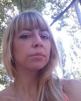 Ксения Мил